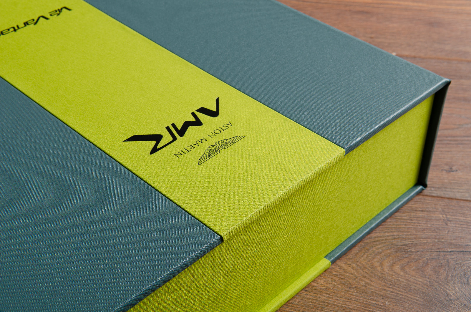 Custom made luxury personalised box file in green fabric with black foil personalised cover