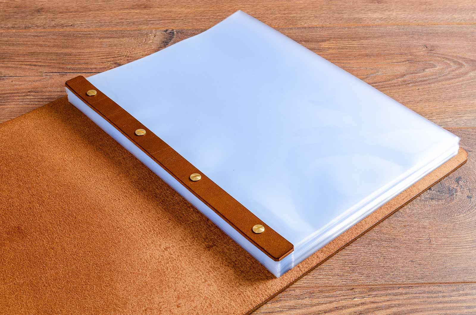 Exposed screw post leather menu cover