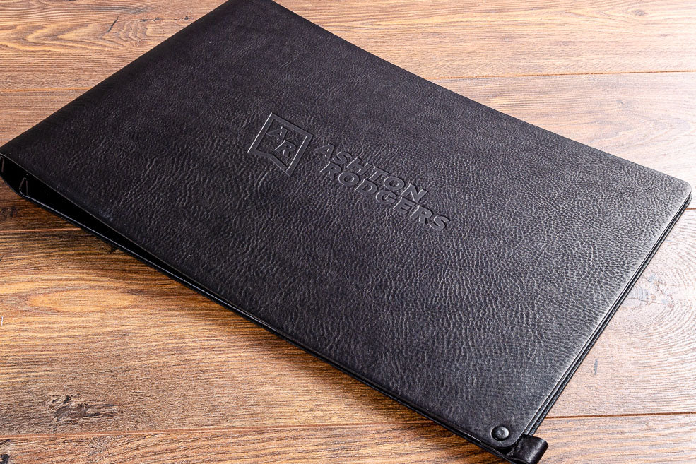 11x17 leather portfolio book in black 2.5mm leather with personalized blind embossing