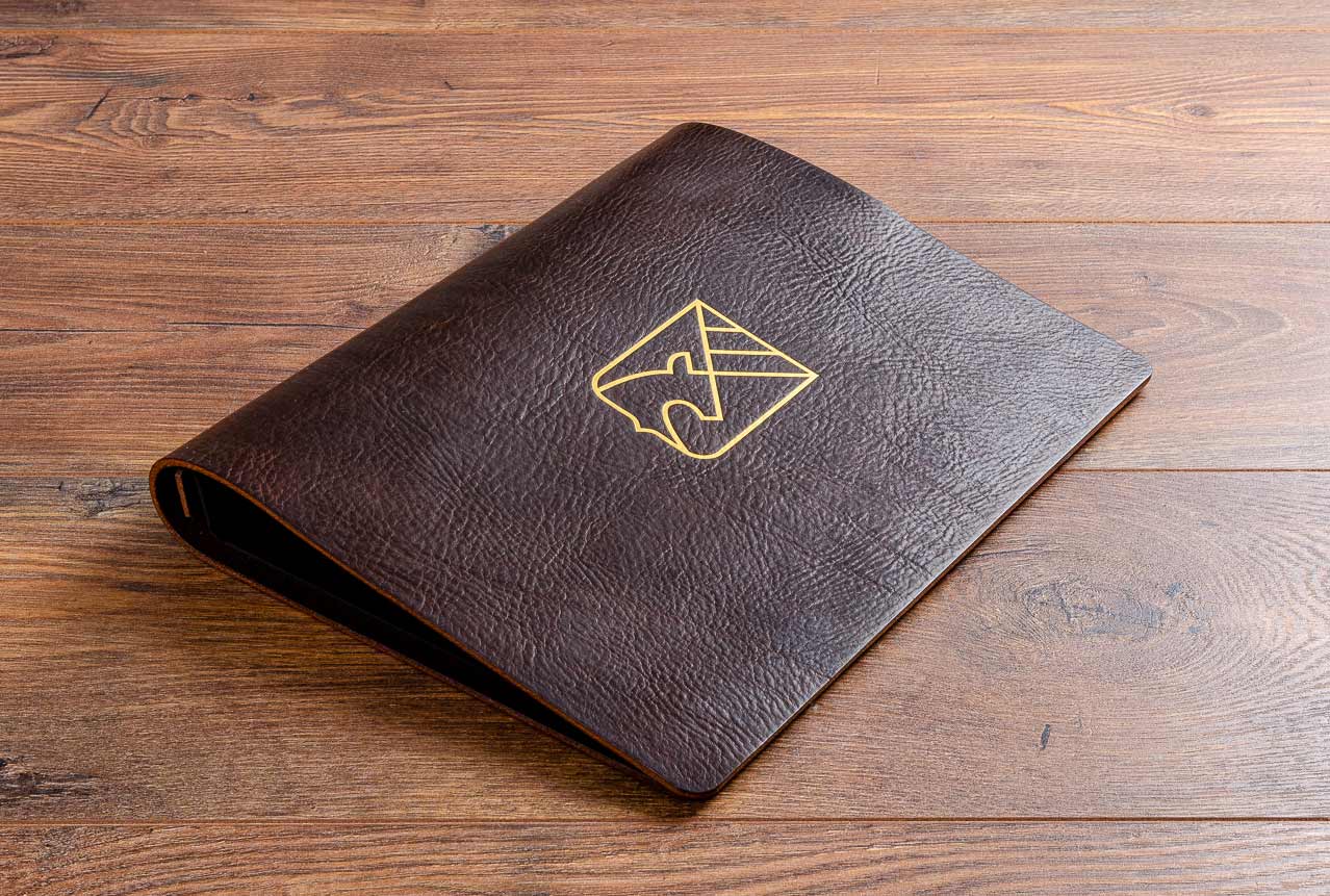 Personalised leather menu cover. 35mm dark brown leather menu cover with gold foil embossing