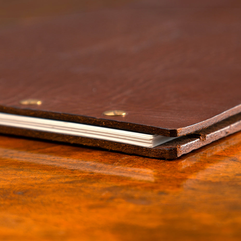 Leather Exposed Screw Post Binder in luxury veg tan leather with bespoke adjustable screw post capacity.