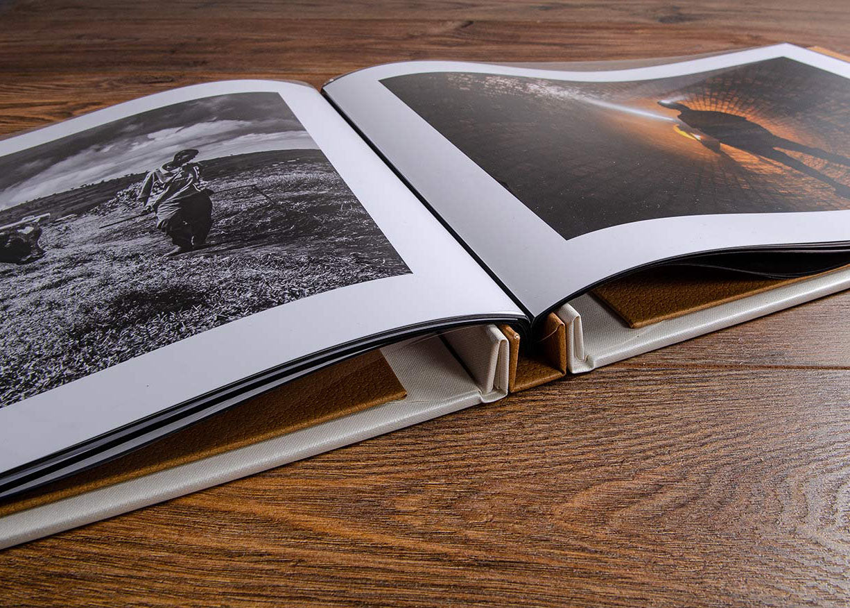 Hidden screw post photography portfolio book with images inside polyester page sleeves