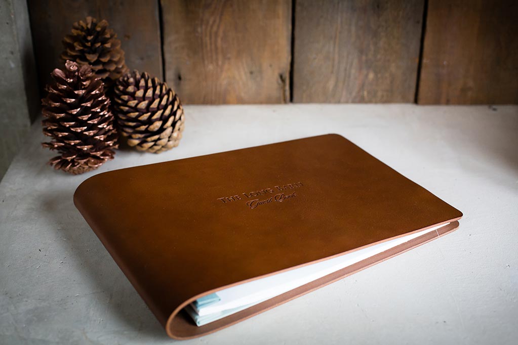 A4 personalised leather guest book in brown leather