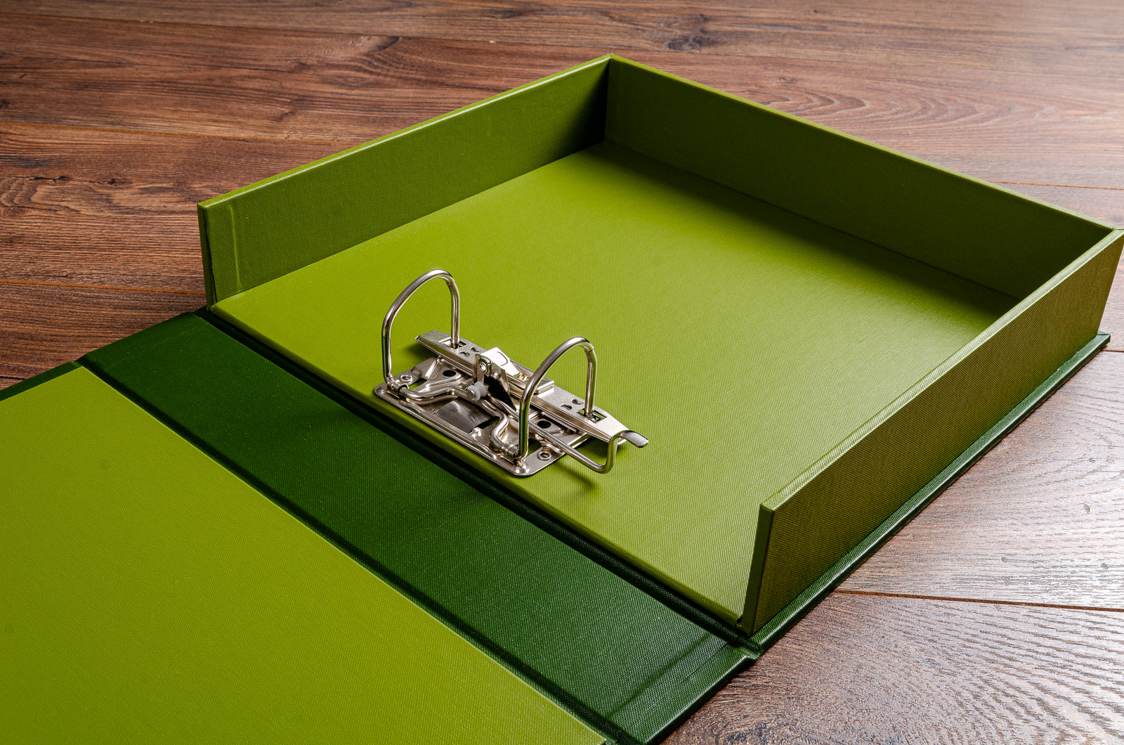 bespoke lever arch clamshell box in green buckram