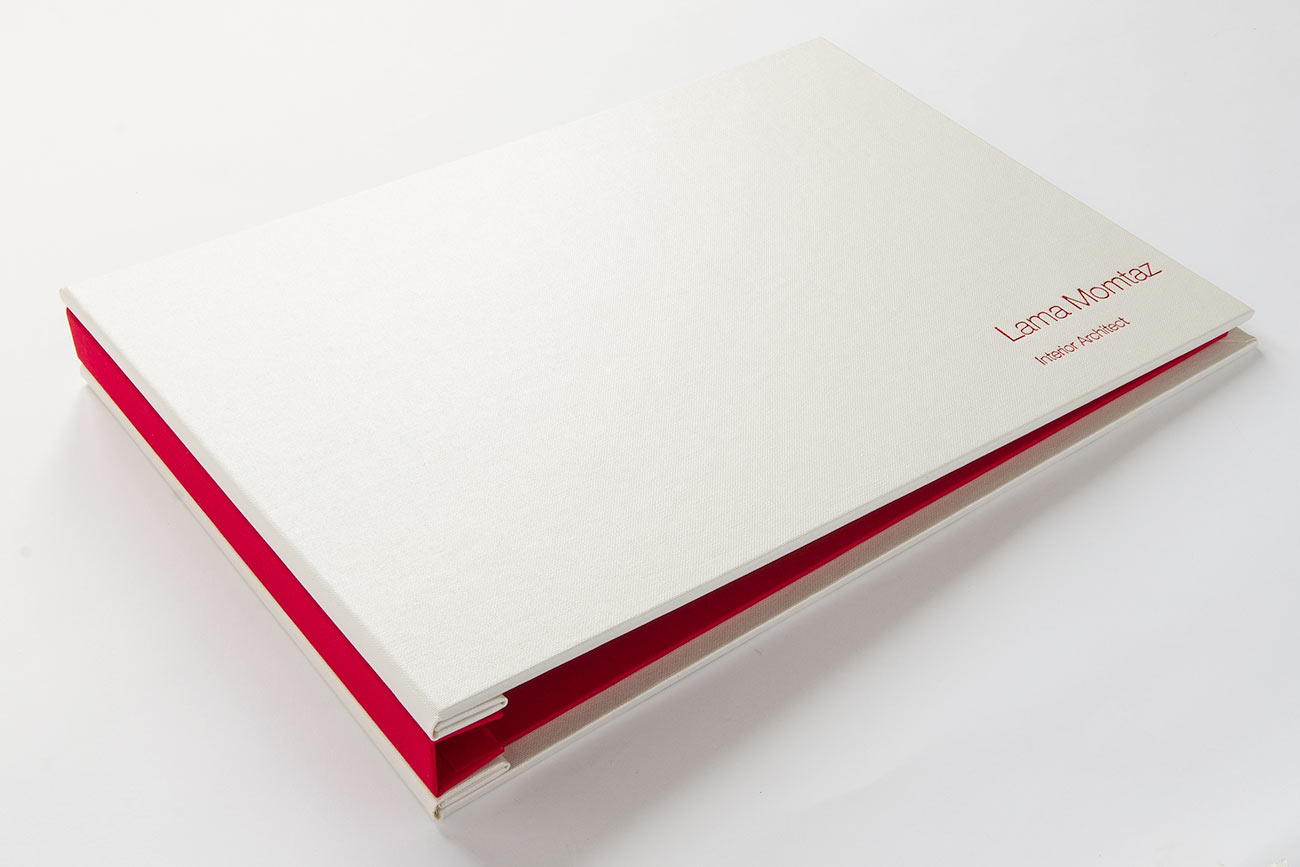 Interior designers A4 presentation portfolio binder in white with red foil embossed cover 