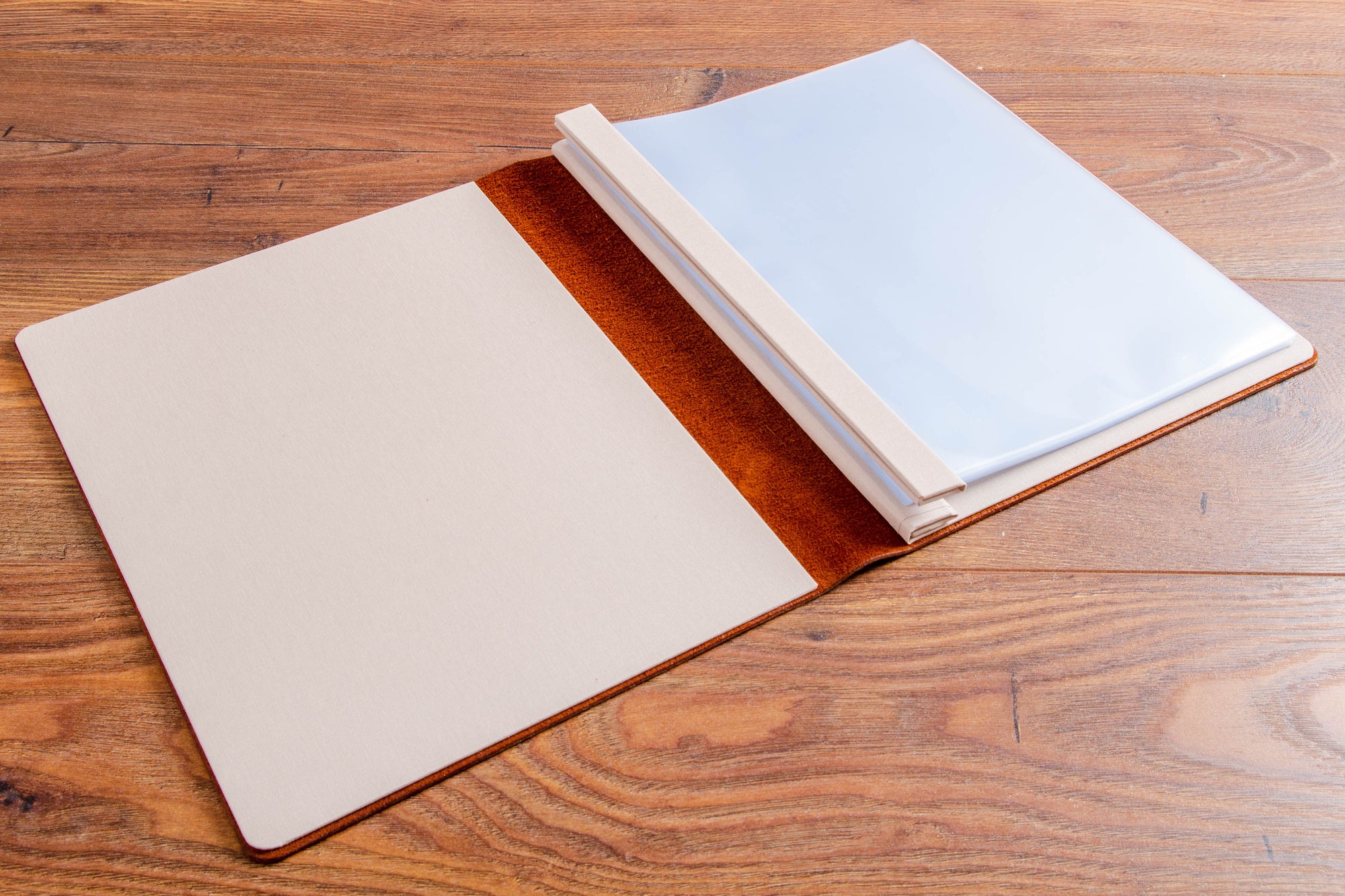 A4 leather screw post binder with plastic page sleeves 