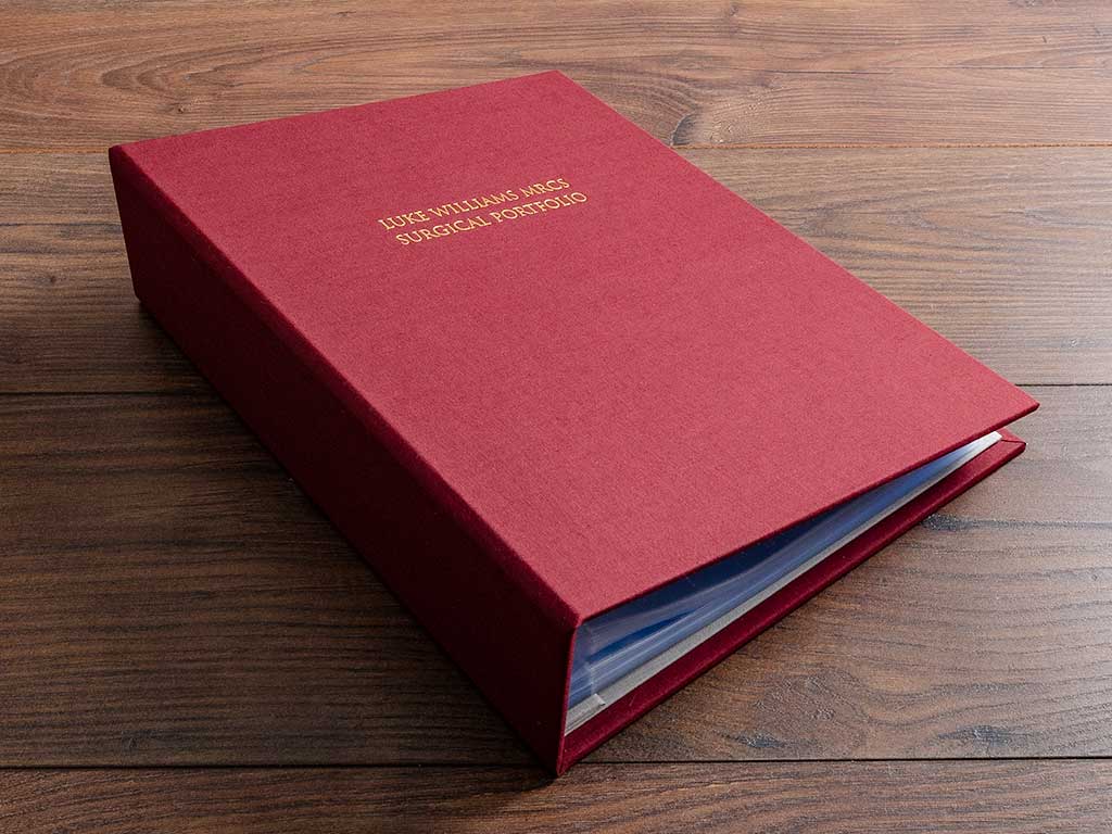 Personalised surgical portfolio with gold foil embossing on the cover and spine