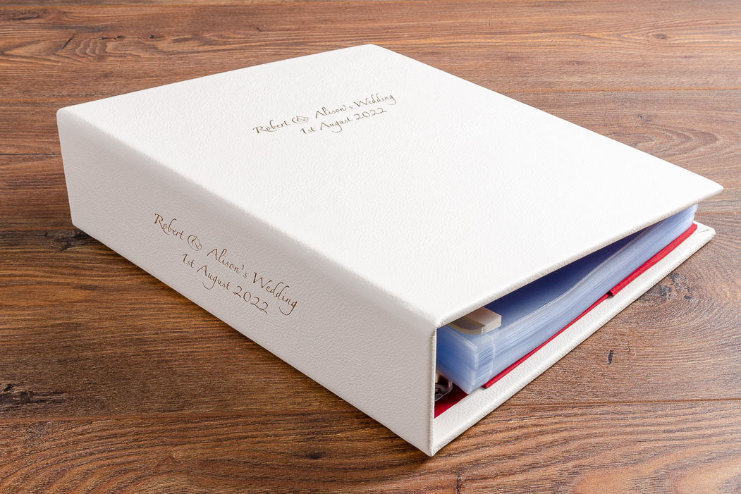 Personalised wedding album with silver foil embossing on cover and spine
