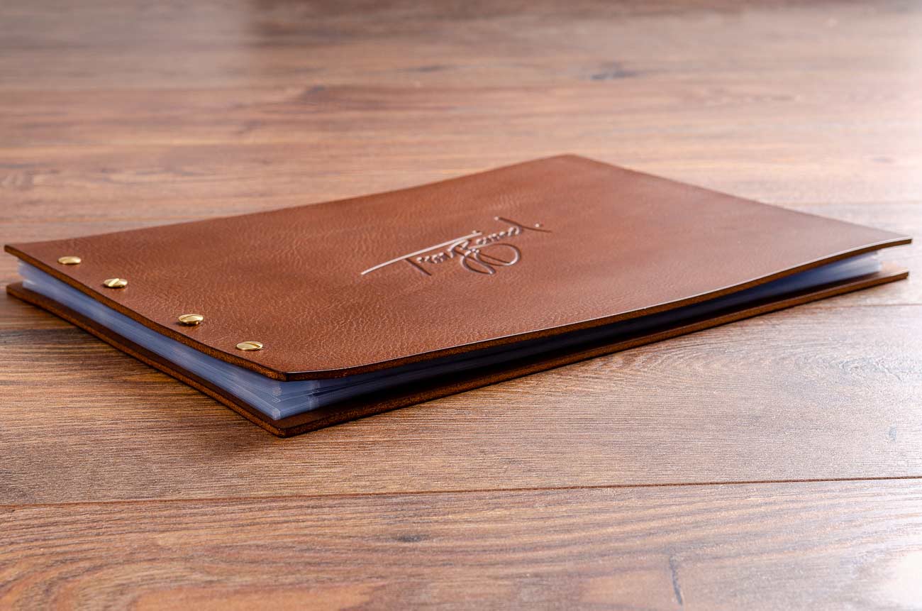 A4 leather portfolio book. Product H&Co Exposed leather binder, A4 Landscape with blind debossed personalisation