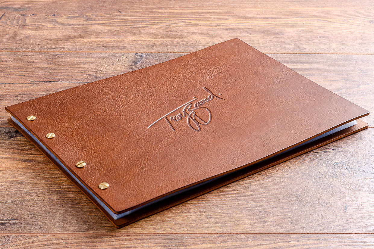 A4 leather portfolio book. Product H&Co Exposed leather binder, A4 Landscape with blind debossed personalisation