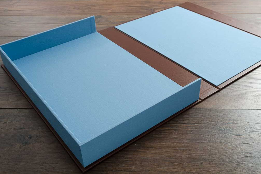 A3 drop back clamshell portfolio box. Box and tray in blue book cloth 