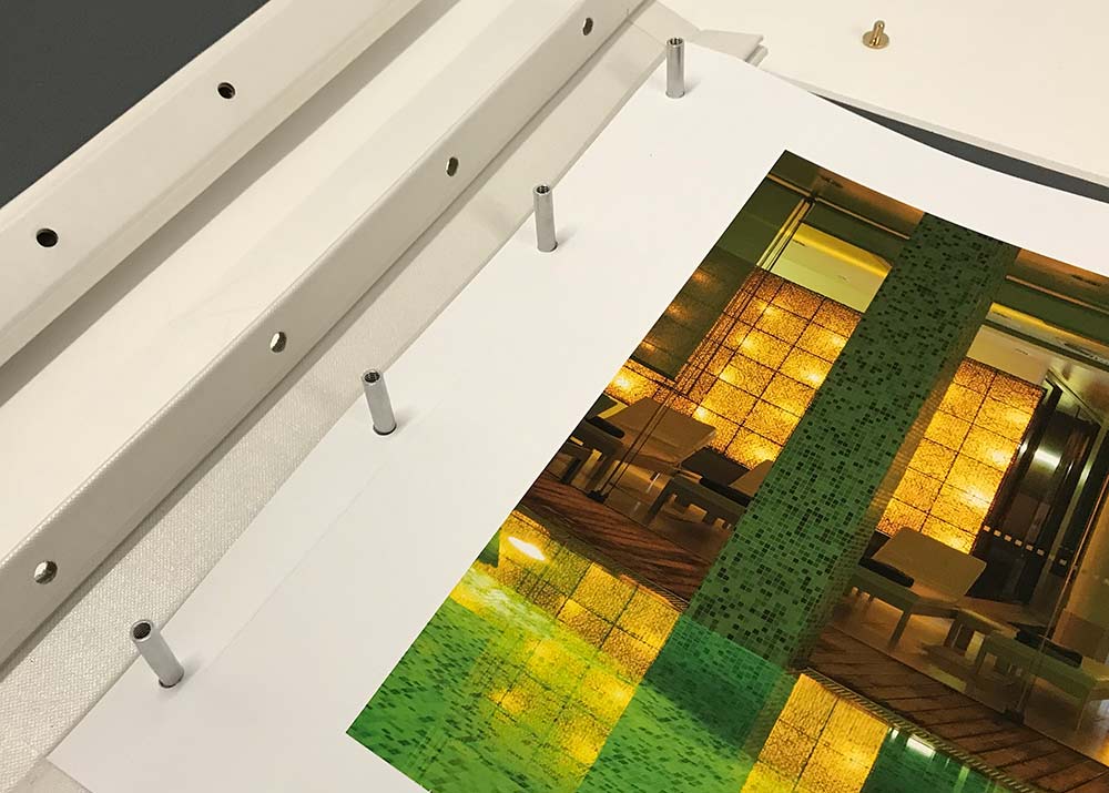 Photography prints inserted screw posts