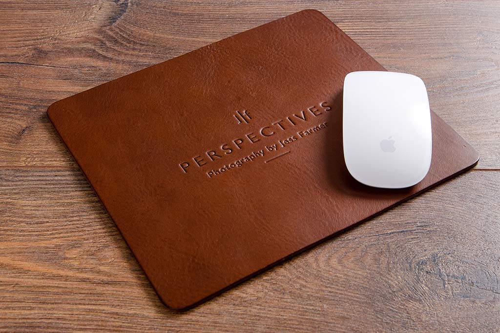 Personalised leather mouse mat with blind debossed logo