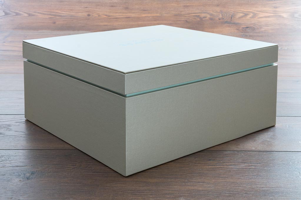 Handmade multi tier keepsake or memory box in beige buckram book cloth