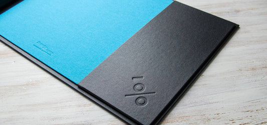 screw post portfolio book with blind embossed inner cover