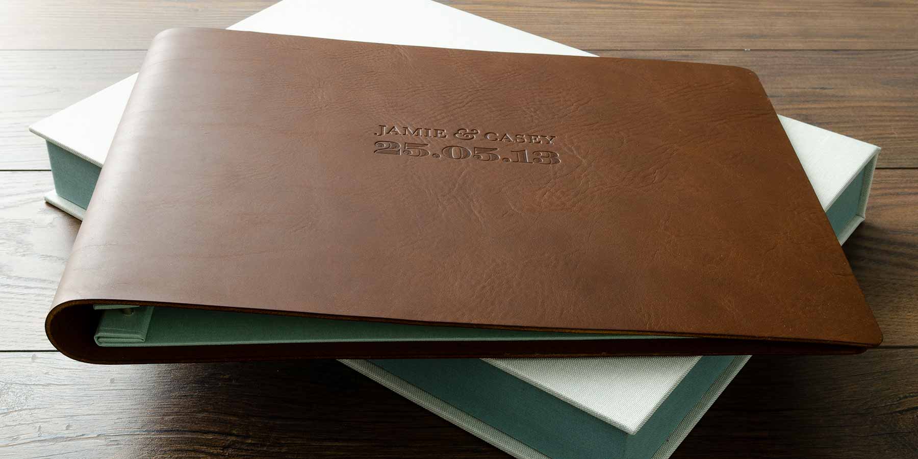 leather is the third anniversary gift this is a custom made leather wedding album to celebrate the date