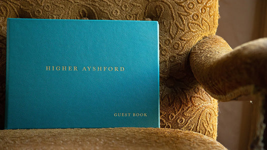 Luxury premium leather bound personalised guest book with gold foil embossing on the cover 
