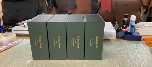 A collection of four personalised box files for a vintage car