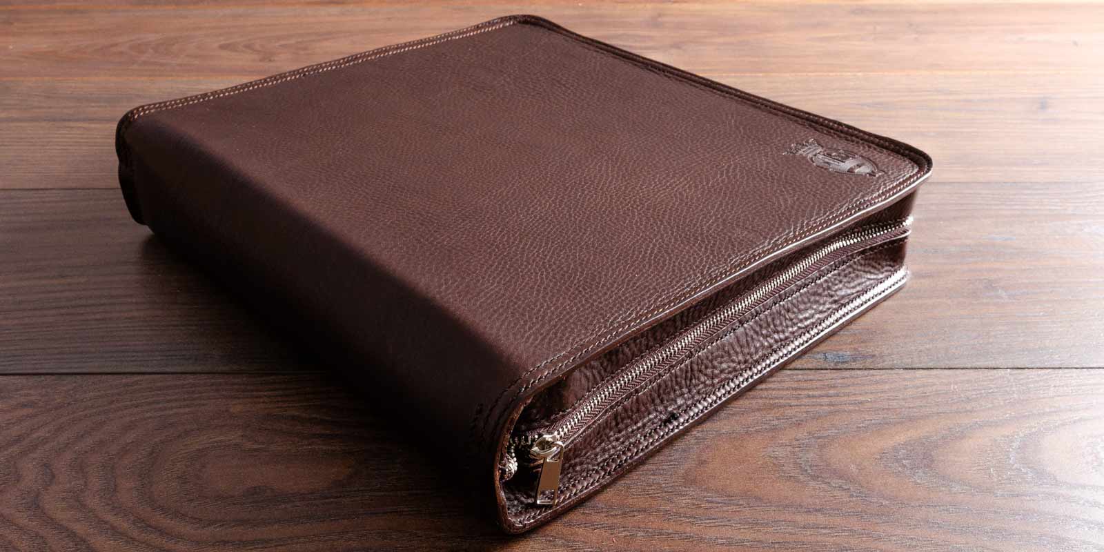 hand made and hand stitched brown leather document portfolio with zip and personalised cover