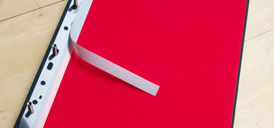 Filing Strips that have holes punched in one end and adhesive tacky strip on other to attach paper or card that can then be placed in file or folder