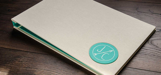 11x17 archaic designers portfolio book with screw post binder mechanisms custom made by jackie hartnack at hartnack and co