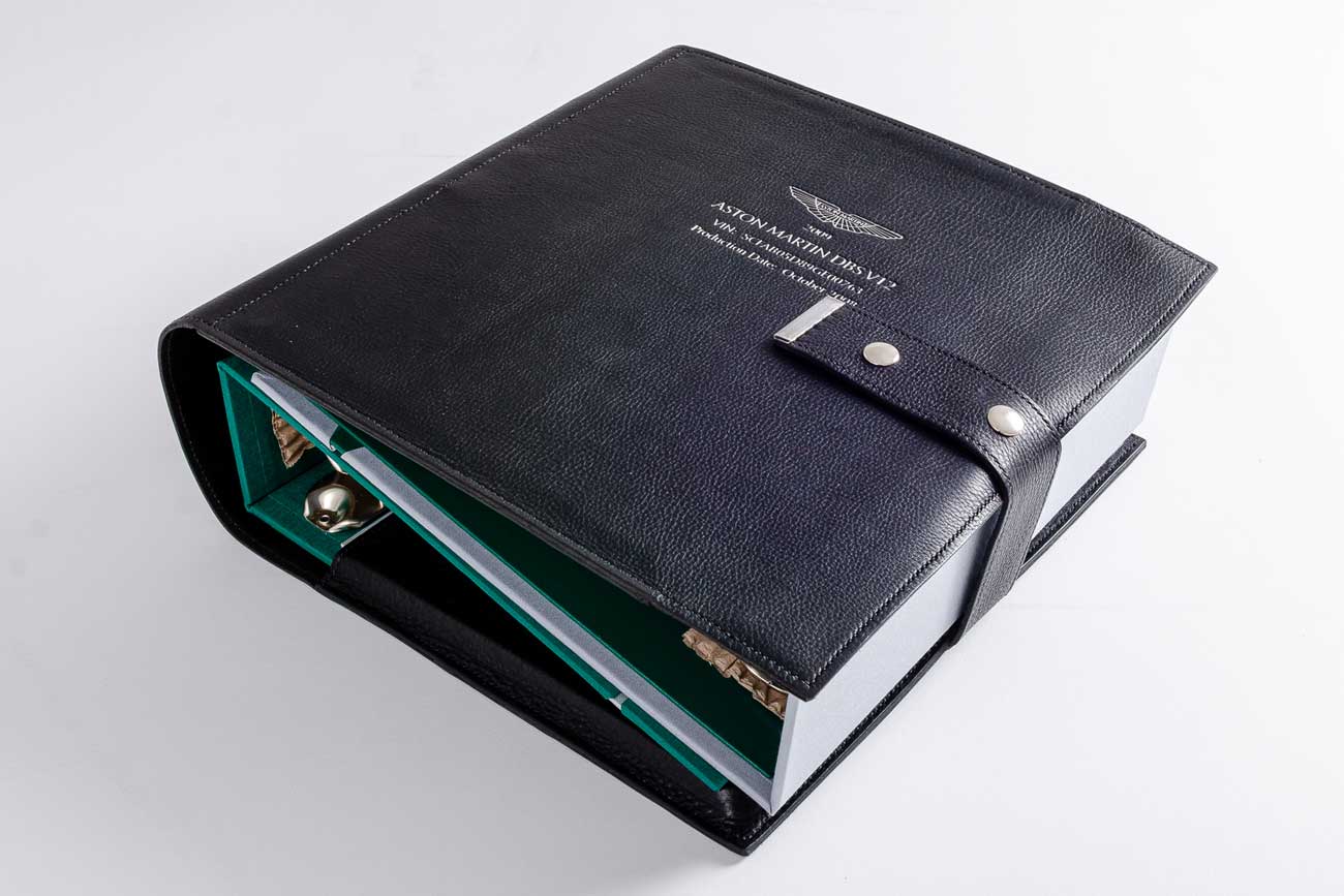 Luxury leather slip case for car documentation ring binders