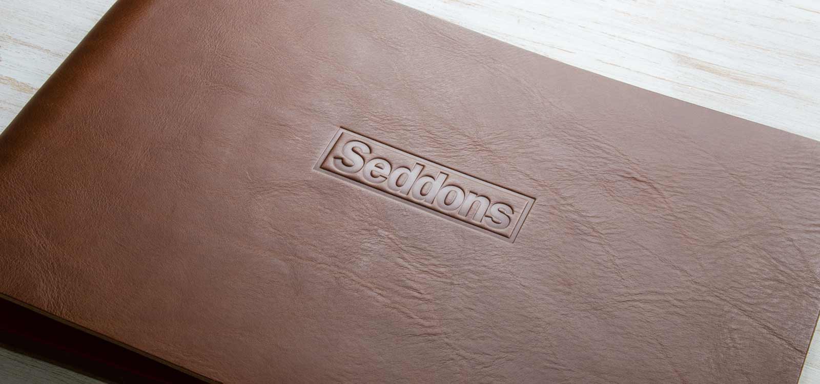custom leather presentation portfolio screw post binder a3 landscape embossed personalised cover made bespoke by hartnack and co 