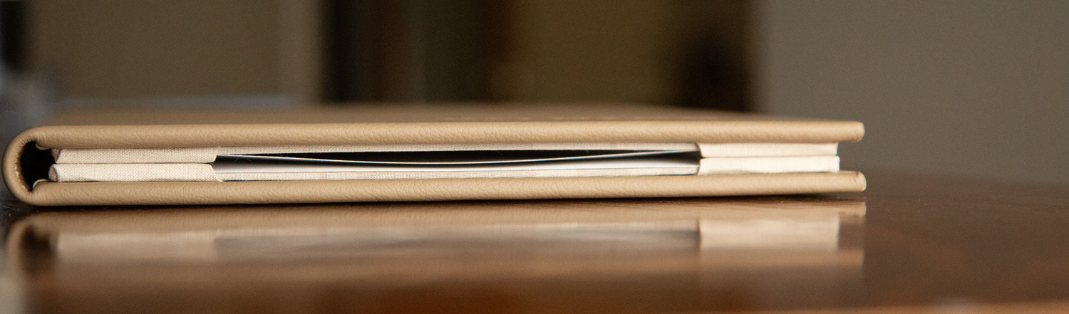 leather bound menu cover on its side