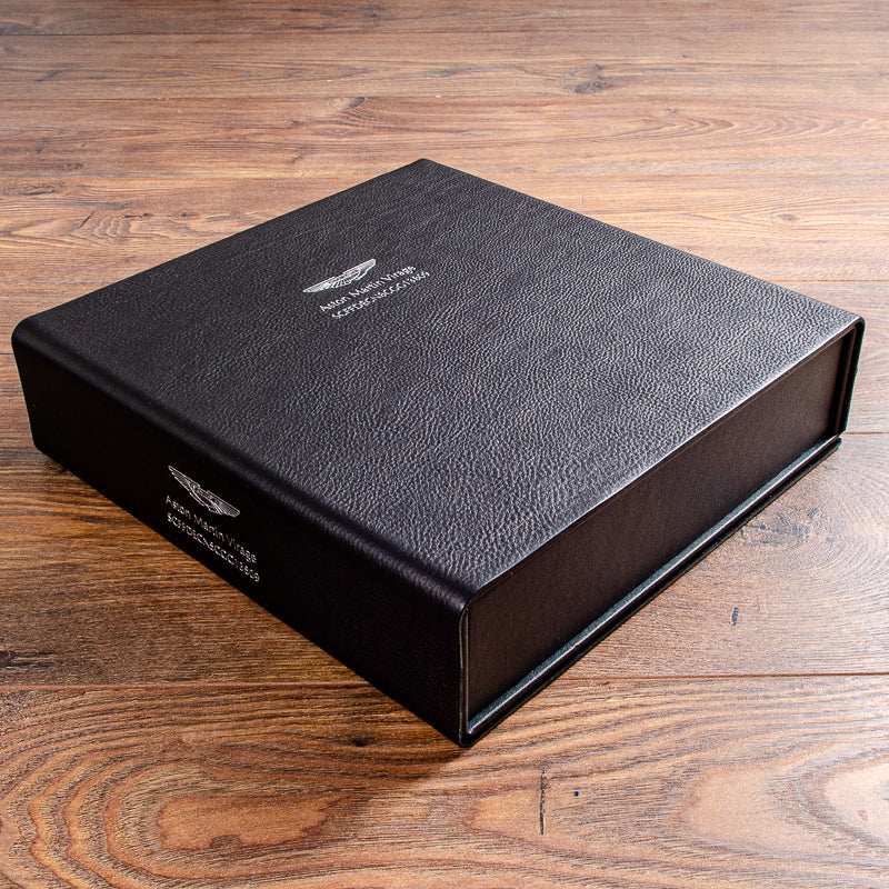 Custom leather box file for vehicle documents with silver embossing on cover and spine