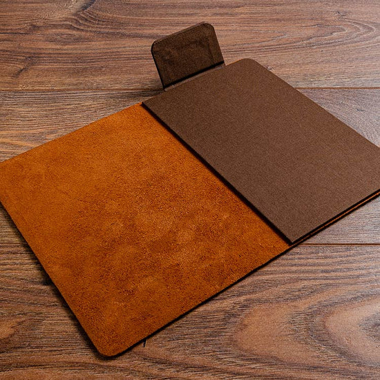 Leather bill fold for a restaurant with magnetic holder clip