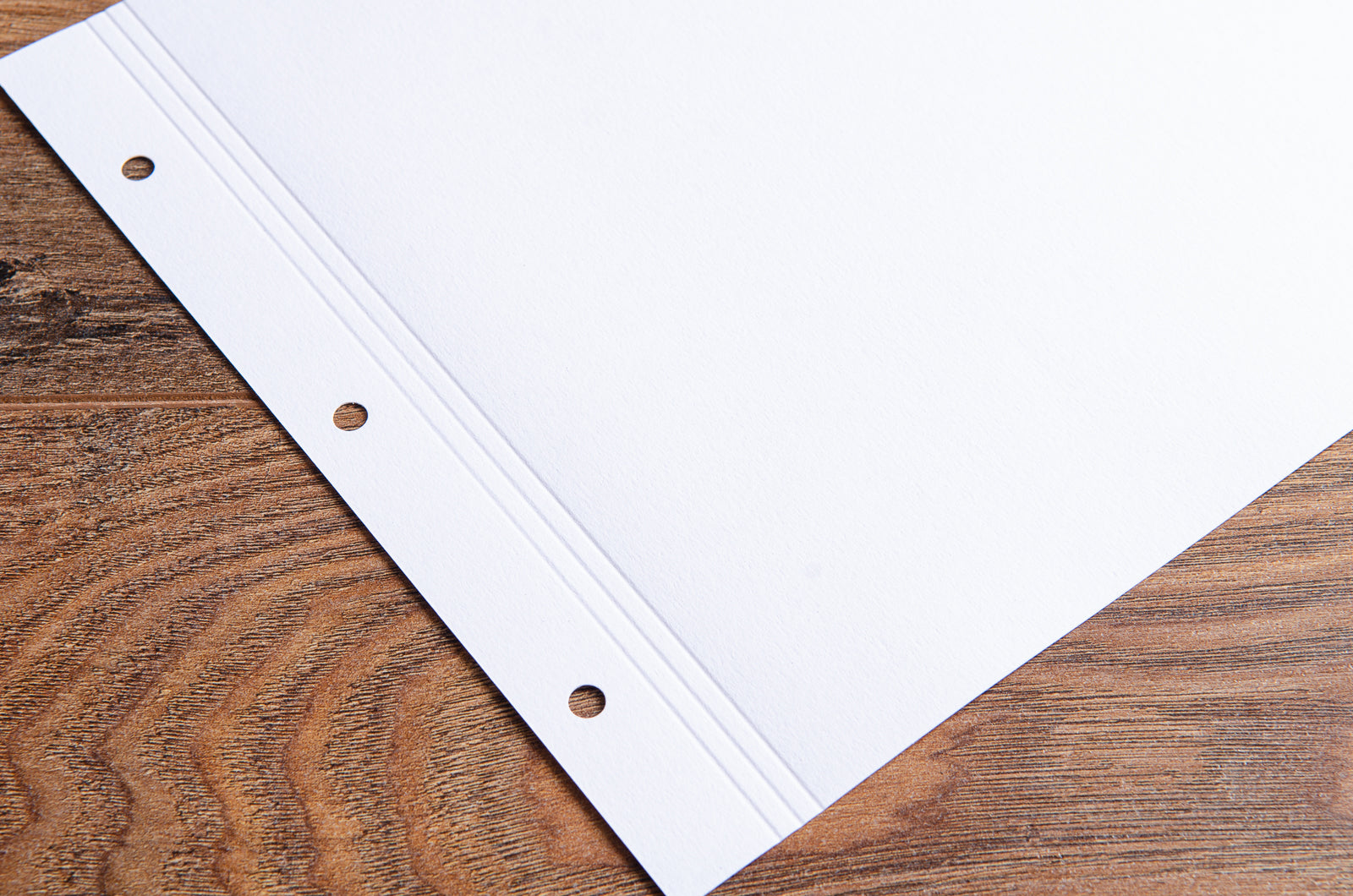 8.5x11 landscape 175gsm paper pre punched with holes and creases and score marks for easy turning
