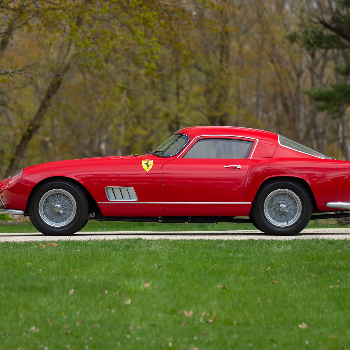 Red Ferrari 250 GTO Tour De France vintage car parked on grass with trees in the background - Gallery image 7