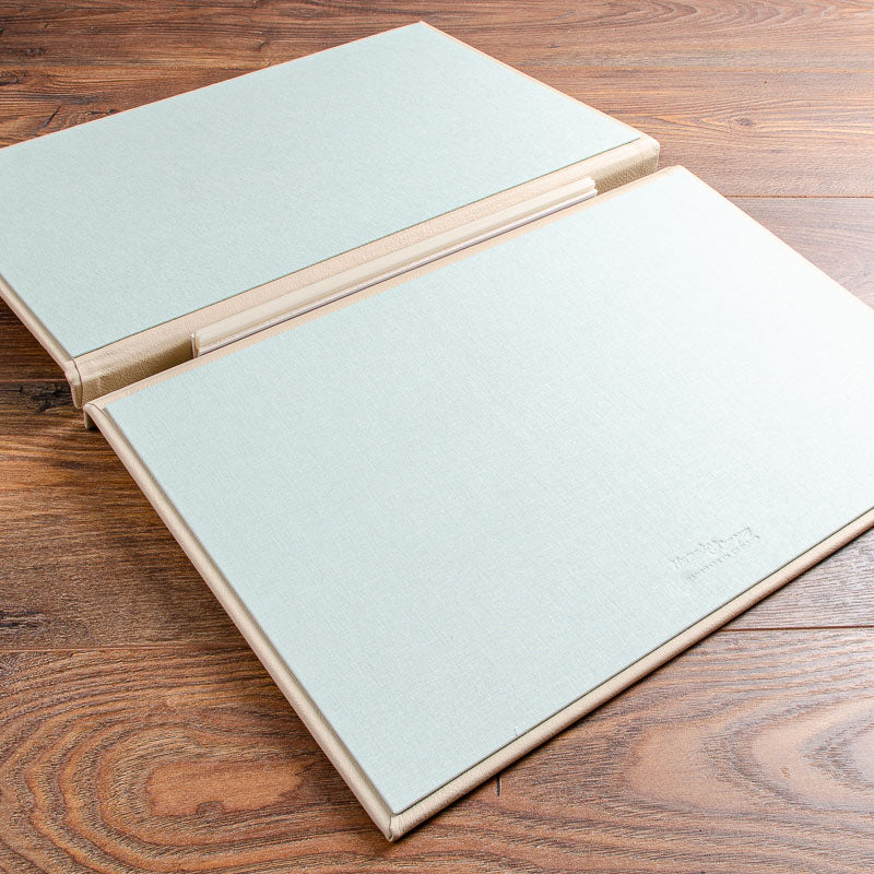 A3 luxury leather screw post binder opening up as flip over portfolio in light green fabric inner cover by Hartnack and Co - Gallery image 2