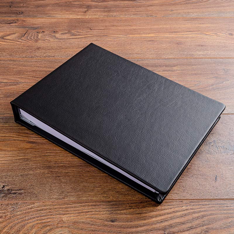Luxury hand made black leather guest book for custom super yacht (personalisation on cover removed)
