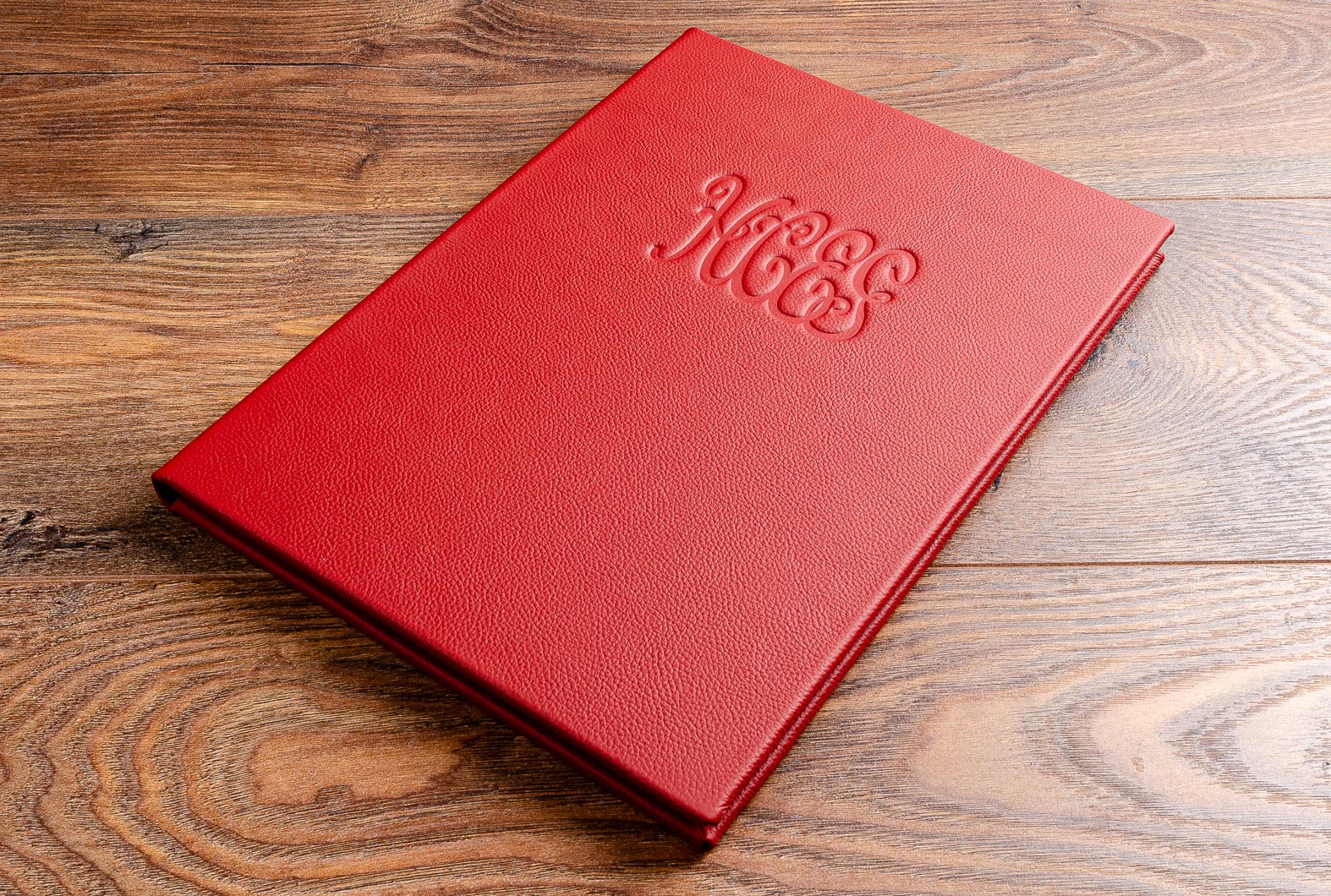 Quality luxury red leather menu holder A4 with blind embossed logo on the cover 