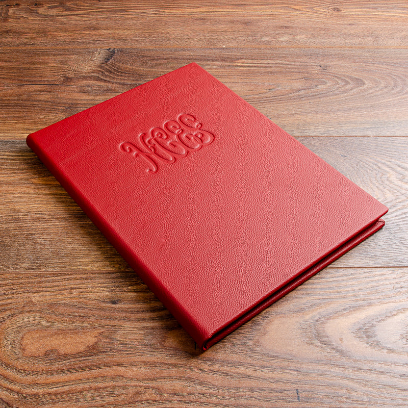 Quality luxury red leather menu holder A4 with blind embossed restaurant logo on the cover  - Gallery image 1