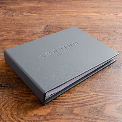 luxury grey leather guest book with personalised blind embossed cover