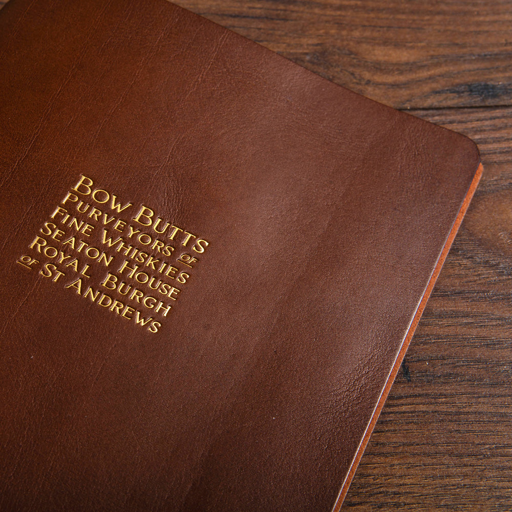 close up of luxury brown leather presentation folder with gold foil embossed cover - Gallery image 2