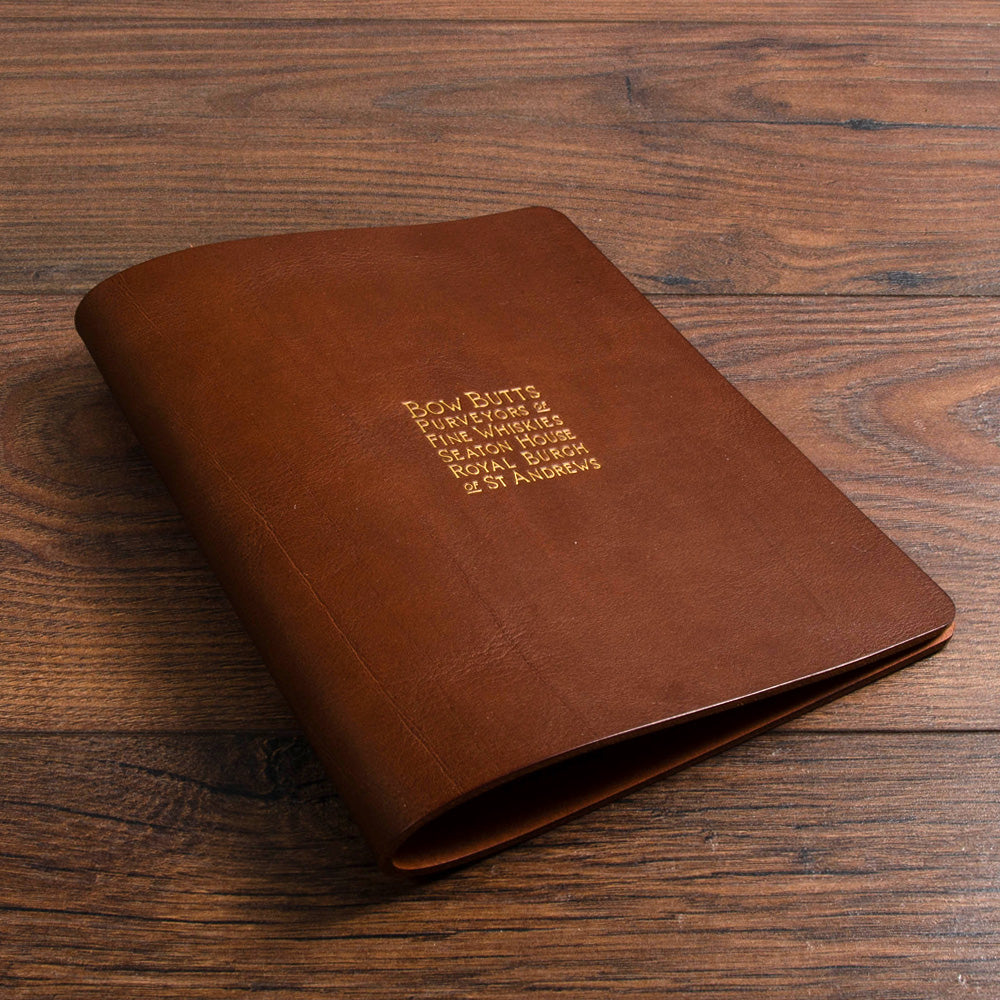 high quality luxury beautiful brown leather menu cover sitting on wooden boards - Gallery image 1