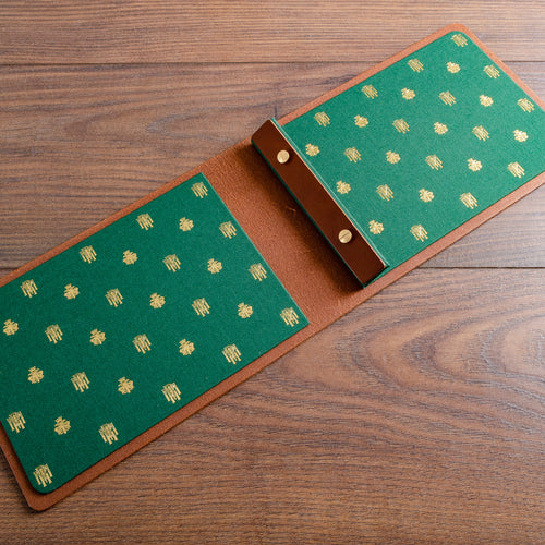 Luxury leather screw post menu cover with gold foiled internal covers