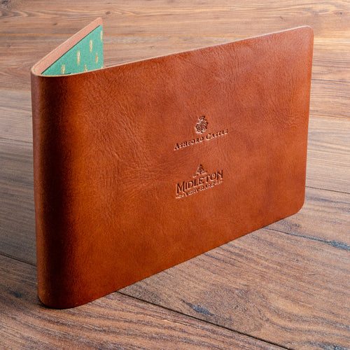 Luxury leather menu cover with embossed personalised logo on cover