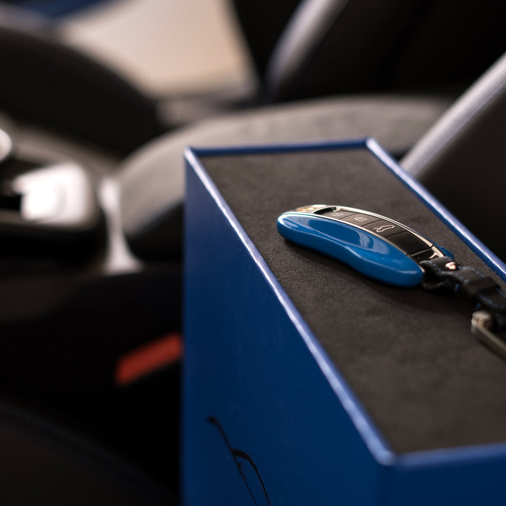 blue porsche car key on suede box file - Gallery image 5