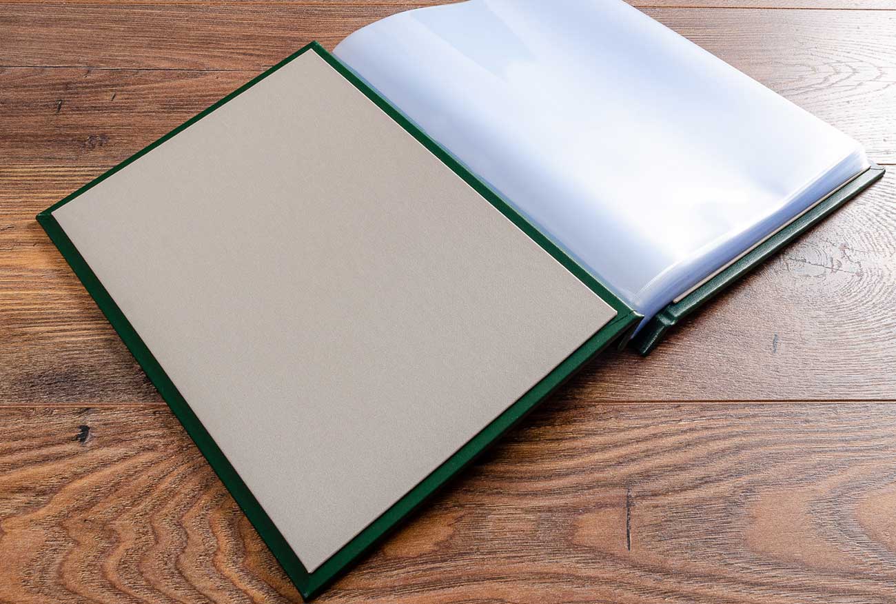 Screw post binder and quality plastic page protector pockets for classic vehicle document and service history