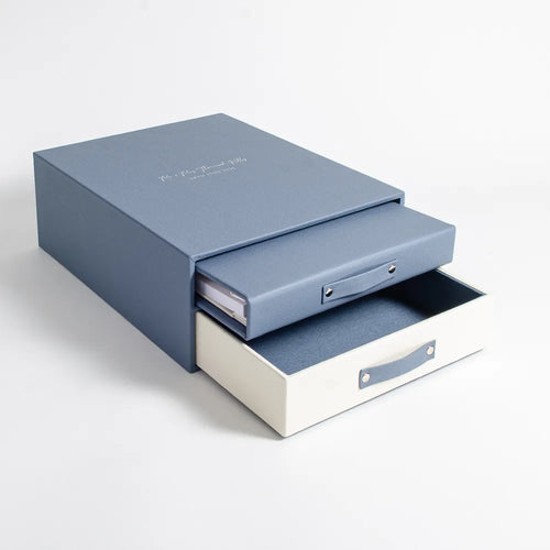 Premium bespoke blue leather wedding keepsake box with storage for blue leather wedding album and drawer underneath for keepsakes. Hand made by Hartnack & Co