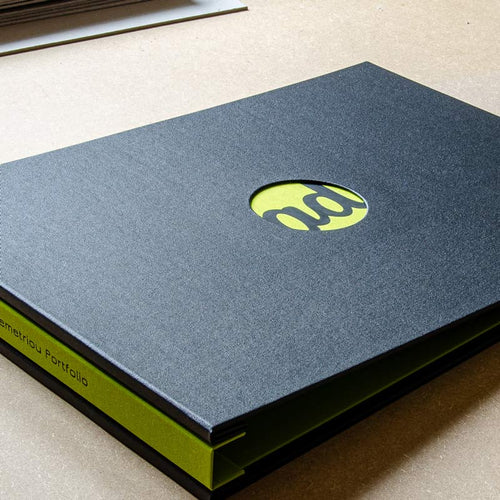 Custom made A3 portfolio book screw post binder in black and green with personalised cover and spine. Handmade by Hartnack and Co