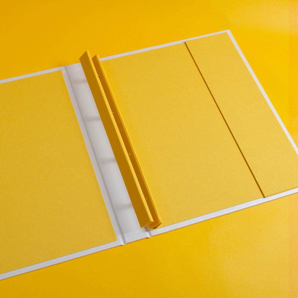 luxury custom made screw post binder for photography portfolio book in yellow and white by Hartnack and Co - Gallery image 6