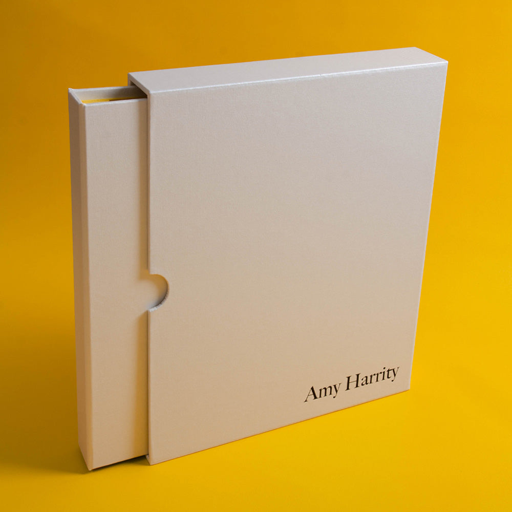 white luxury custom made portfolio book and slipcase cover with black foiled personalised cover by Hartnack and co - Gallery image 1