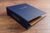 Personalised Anaesthetists medical portfolio in blue faux leather with copper foil personalisation on the cover and spine 