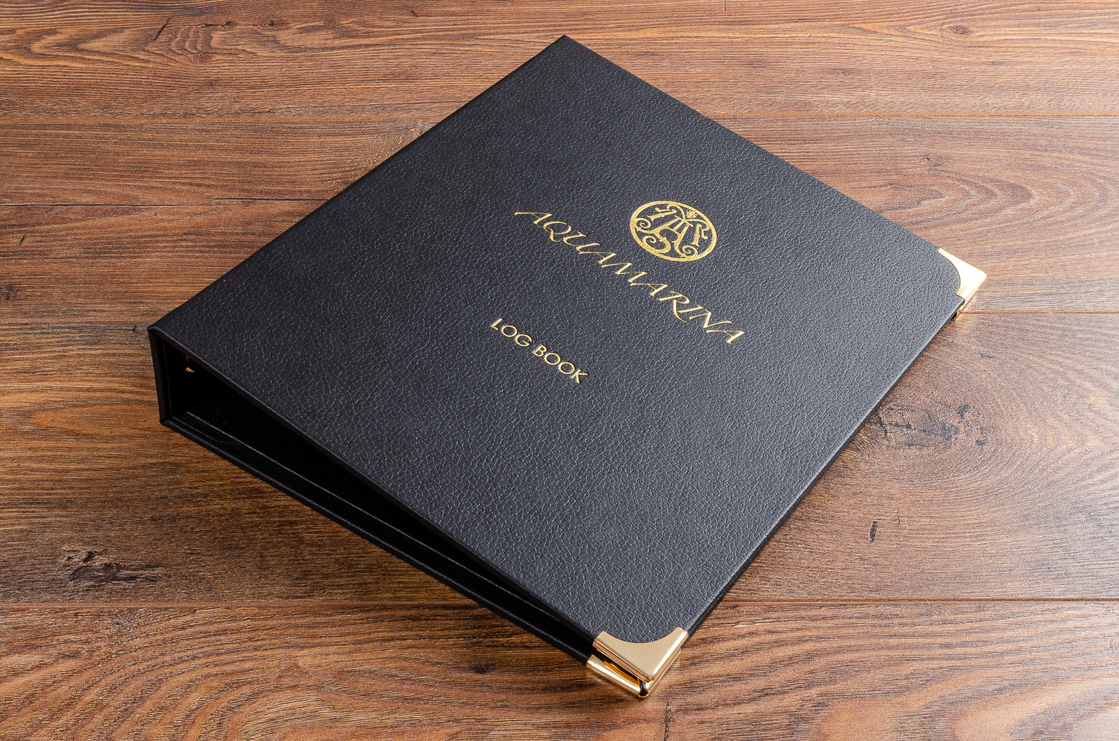 A4 faux leather log book for super yacht with luxury gold edgings and personalised in gold foil