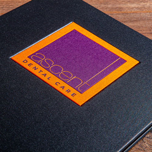 beautiful detailed personalisation plaque set within company presentation binder